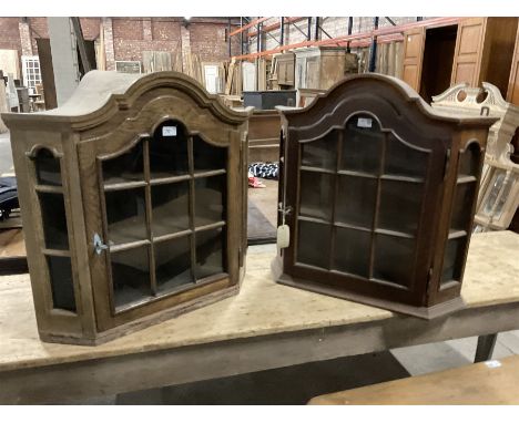 Dutch design oak wall hanging apothecary cabinet, of arched form with single astragal style glazed door enclosing single shel