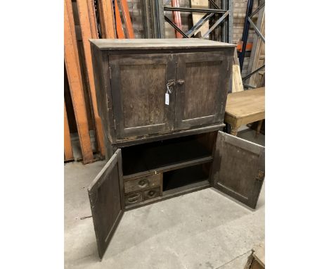 Two early 20th century pine cupboards, enclosed by panelled doors, each fitted with shelf and drawers Dimensions: Height:&nbs