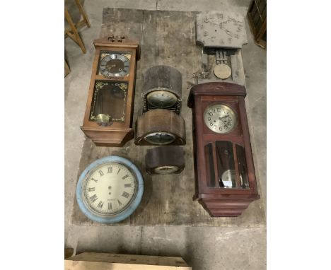 Mappin and Webb early 20th century oak mantle clock, two other mantle clocks, three wall clocks and a Thirsk dial clock