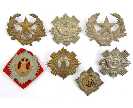 7 glengarry badges:  R Scots NCO’s enamelled, OR’s bi-metal and all brass, Cameronians WM and brass, HLI long and short scrol
