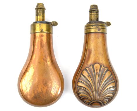 A medium size embossed copper powder flask “Bush” (R 330) 6½” overall; and a similar plain copper flask, both with common top