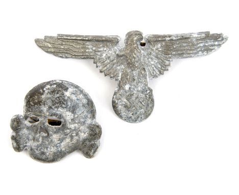 A matching pair of Third Reich Waffen SS white metal cap eagle and skull, both marked “RZM” and “M1/52”. GC (light surface co