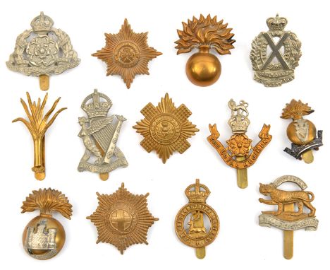 5 Guards cap badges, one for each regt; 3 Irish caps: R Inniskilling flag right, R.I. Rifles WM and 2 part R.I Fus harp on ba