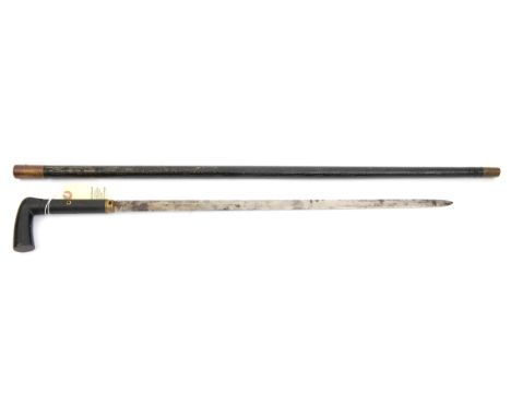 A late 19th century swordstick, the broad SE 21” blade of thin wedge section, the haft having dimpled finish overall and with