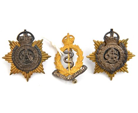 3 officer’s cap badges: Army Service Corps (988 and 989), enamelled RAMC with brooch pin. GC to VGC Part III of the Collectio