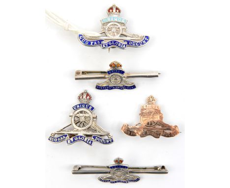 3 R Artillery sweetheart brooches, design as for cap badge, 2 red and blue enamelled, marked “Silver”, the other flat gilt ma