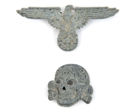 A Third Reich Waffen SS white metal cap eagle and skull pair, unmarked, with brass wire pins. Basically GC (light surface cor