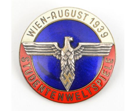 A scarce Third Reich pin back badge,  for the Student World Games, Vienna, August 1939, in red, white and blue enamel with si