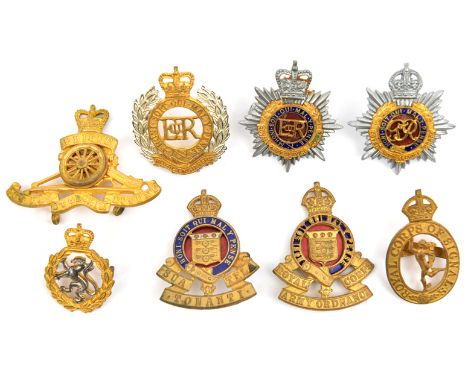 7 officer’s gilt/ silver plated cap badges: ERII RA, RE, RASC enamelled and WRAC, Geo VI RASC enamelled, KC Ordnance enamelle
