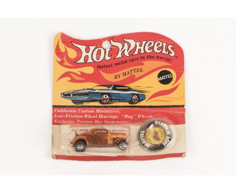 A scarce 1969 issue Mattel HotWheels ‘Californian Custom Miniatures’ 1936 Ford Coupe. Finished in vacuum plated orange. Still