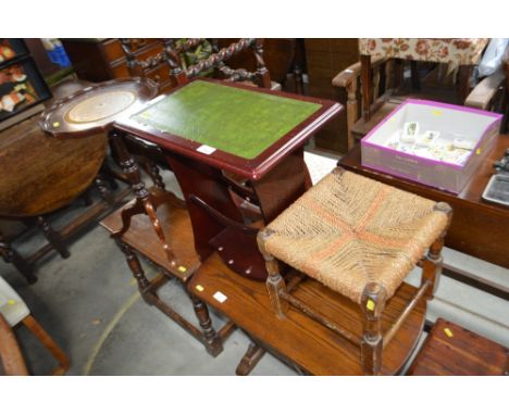 A leather topped wine table; together with a leather topped magazine rack  AF; and a string topped stool  