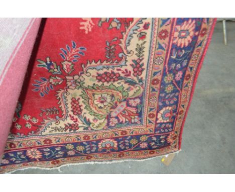 An approx 9'6" x 6'4" floral patterned carpet