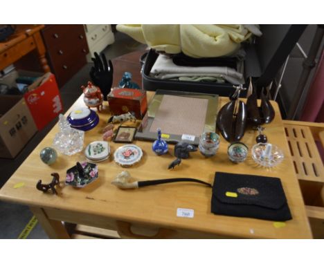A quantity of decorative items to include scent bottle, ring stand, pipe, Bakelite shoe stretchers, Poole otter, lead farm an
