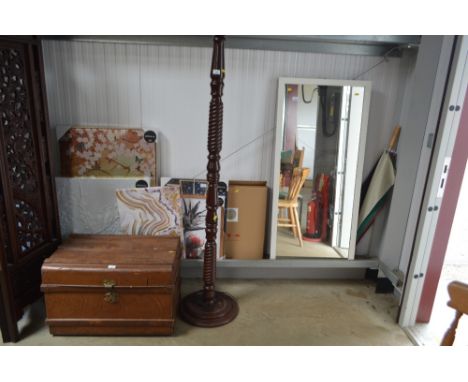 A turned standard lamp