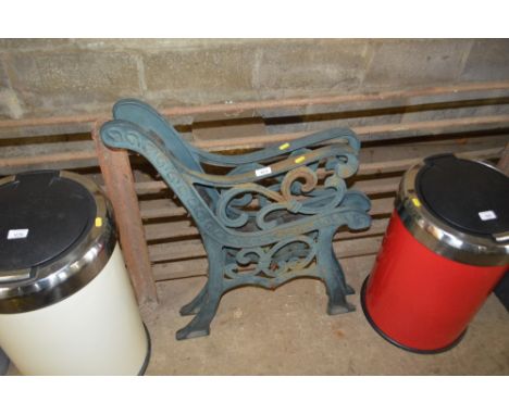 A pair of garden bench ends