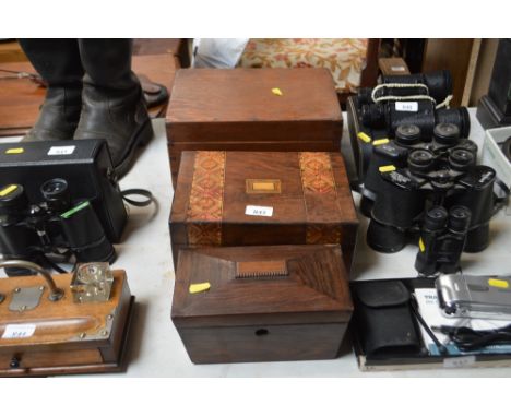 A wooden storage box; together with an inlaid storage box and a sarcophagus shaped tea caddy