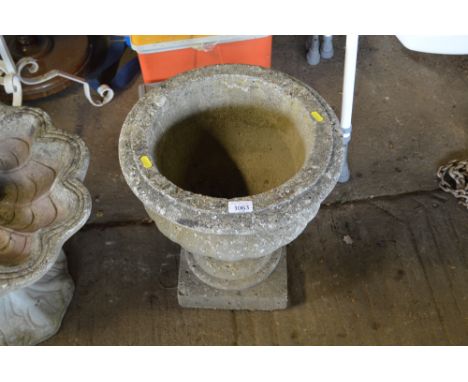 A concrete garden planter