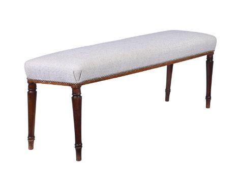 A MAHOGANY AND UPHOLSTERED WINDOW SEAT OR HALL BENCH IN REGENCY STYLE  19TH CENTURY 46cm high, 125cm long, 33cm deep