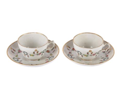 A PAIR OF BRISTOL (RICHARD CHAMPION) HARD-PASTE PORCELAIN TEACUPS AND SAUCERS  CIRCA 1775 Each painted with a swag band, the 