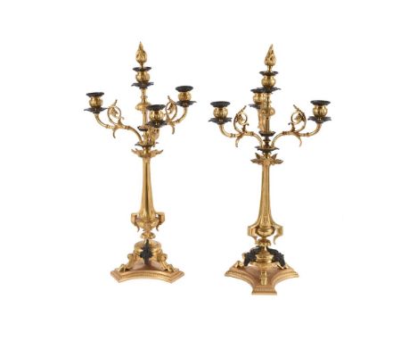 A PAIR OF FRENCH ORMOLU AND PATINATED FIVE LIGHT CANDELABRA  LATE 19TH OR EARLY 20TH CENTURY  57.5cm high including flambeau 