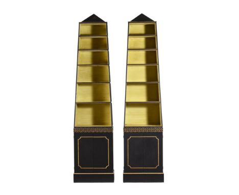 A PAIR OF EBONISED AND PARCEL GILT 'PYRAMID' OPEN BOOKCASES, IN REGENCY STYLE, BY JOHN FOWLER MID 20TH CENTURY each 271cm hig