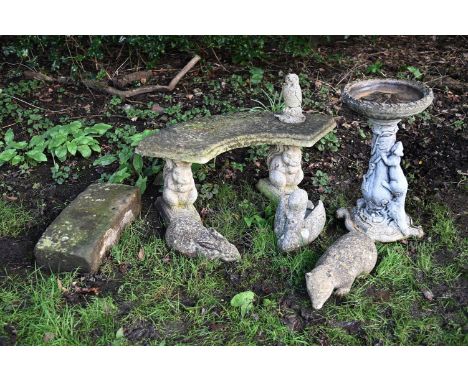 A GROUP OF MODERN STONE COMPOSITION GARDEN ITEMS OF ANIMAL INTEREST  Comprising a garden bench, 43cm high, 105cm wide, a bird