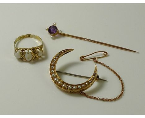 A collection of gold jewellery, comprising an 18ct gold and opal ring, the three oval opals held within raised pierced claws 