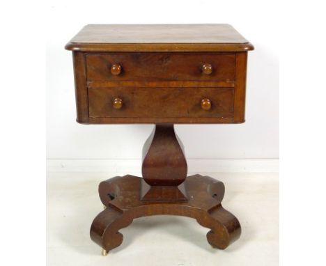 A Victorian mahogany side table, converted / made up, with two drawers and turned handles, fitted on a square baluster column