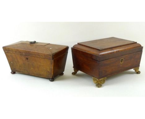 A Victorian rosewood veneered over mahogany, brass strung, casket, raised on four brass scroll and paw feet, the inner trays 