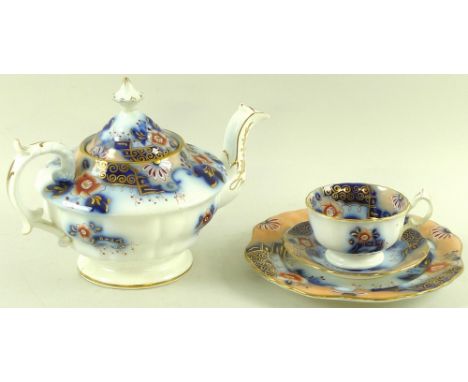 A late Victorian tea set in blue and peach palette on white ground and with gilt detailing, comprising twelve cups, twelve sa