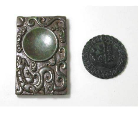A Chinese spinach jade ink holder palette, with carved dragon, 9 by 6cm and a Chinese spinach jade circular pendant carved wi