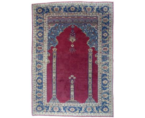 A fine antique Persian Teheran prayer rug, 'The Entrance to Temple', with wine coloured ground, mihrab arch over a hanging ba