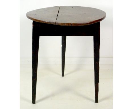 An 18th century cricket table, with circular elm surface, later base with three tapering legs, 58.5 by 69cm high.Provenance: 