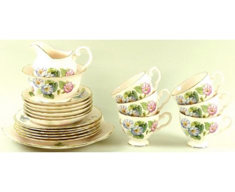 A Tuscan China part tea service decorated in the Plant pattern, depicting Morning Glory on a pink ground, with gilded rims, c