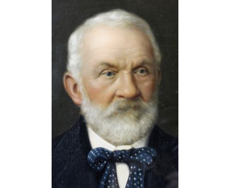 A 19th century portrait of a Victorian gentleman with white beard, and spotted bow tie, oil painted onto a gelatin photograph
