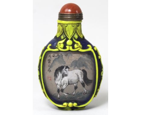 A Chinese reverse painted glass snuff bottle the reserves decorated with a white horse and a brown horse verso, signed with p