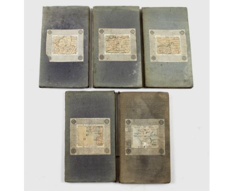 A group of five folding maps, circa 1880, engraved and printed onto linen backing in 21 sections with card and cloth cover, a