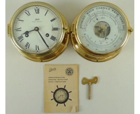 A ship's porthole style dual barometer and thermometer, by Schatz, together with a similar port hole clock, Roman numerals to