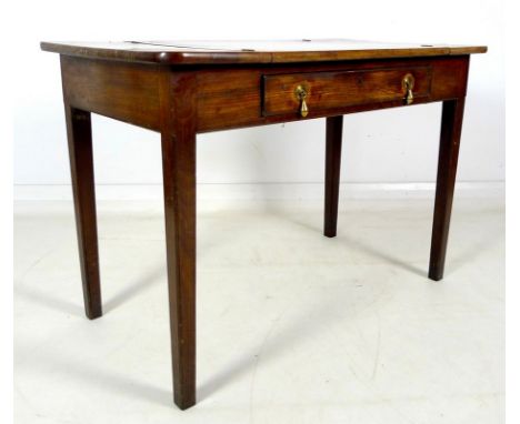 An early 19th century mahogany sewing table, rectangular surface with lift flaps to either end opening to reveal divided stor