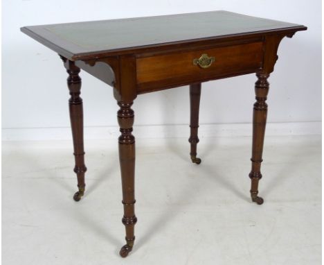 A late Victorian mahogany side table, green tooled leather surface, single frieze drawer with brass handle, turned supports a