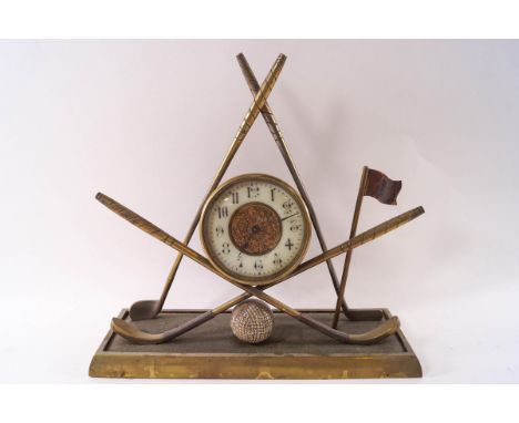 An early 20th century brass golfing mantel clock, 28cm high x 30cm wide