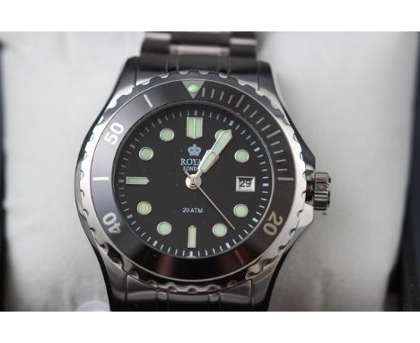 A Gentleman's wristwatch by Royal London. Round black dial with illuminous markings and date feature. Black ceramic bezel. St