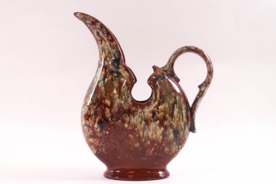 A Watcombe Pottery Jug In The Manner Of Christopher Dresser Of