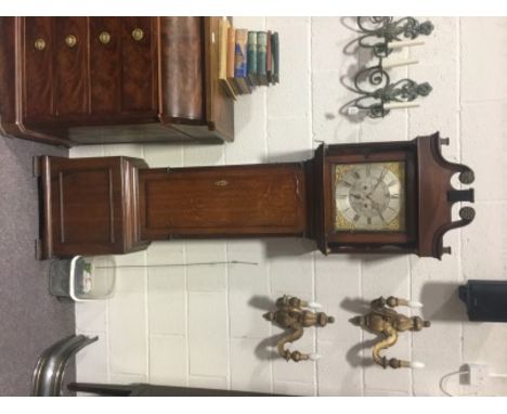 An 18th century oak eight day longcase clock by J Schofield, Barnsley, the silvered 12" dial with engraved decoration and pie