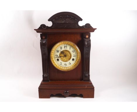 An Edwardian  mahogany mantel clock, the movement striking on a gong by The United Clock Co Ltd, Birmingham, 41cm high