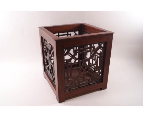 A Japanese square wooden planter with fretwork sides, 27cm high x 25.5cm square