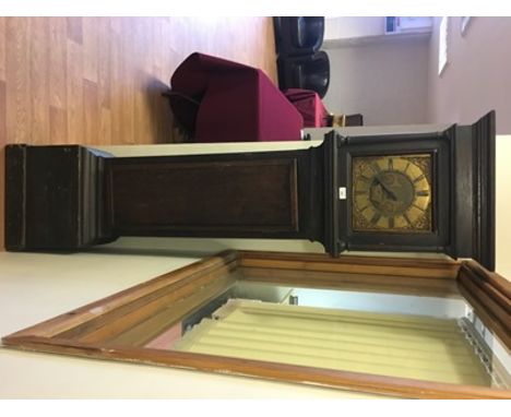 An early 18th century 30 hour oak longcase clock by Joseph Carswell, Hastings, the 10" brass dial with single hand and later 