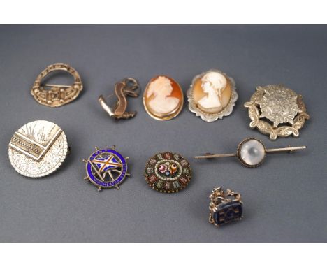 A selection of items consisting of : four sterling silver brooches of abstract design, two sterling silver cameo brooches, a 
