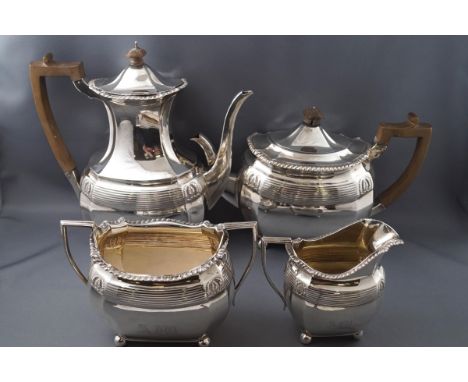 A  Victorian four piece silver tea set, comprising of a hot water jug, a teapot, a two handled sugar basin and a milk jug, ea