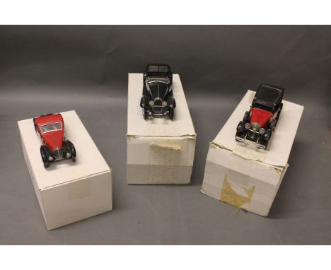 3 boxed Franklin Mint Precision models of vintage cars